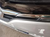 a close up of the front bumper of a car