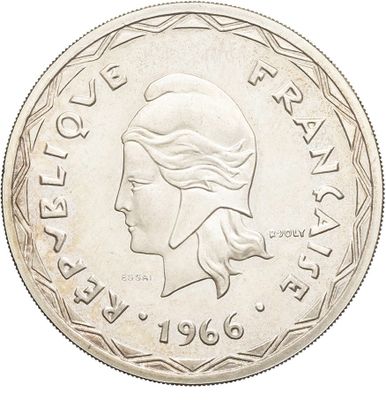 a close up of a coin with a woman ' s face on it