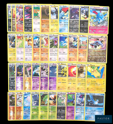 a lot of pokemon cards on the table together