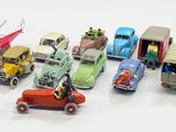 a lot of toy cars that are sitting on a table