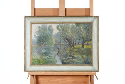 a picture of a painting on a easel with a painting on it