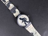 a watch that has a picture of a person on it