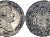 une pièce en argent portant le portrait d'un homme