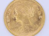 an image of a gold coin with a woman ' s face on it