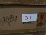 a cardboard box with a picture of a wrestling ring on it