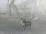 drawing of a man walking a dog on a beach with a woman walking behind him