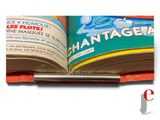 an open book with a picture of a fish on it