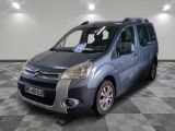 the grey van is parked on a checkered floor in the garage