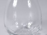 a glass vase that is sitting on a table