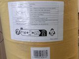 a large yellow barrel with a sticker on it