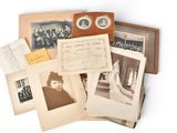 many old photographs of women and men on this table