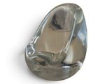 a glass object that is sitting on a white surface