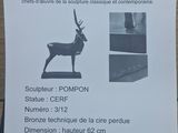a sign with a picture of an antelope on it