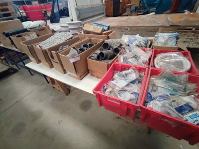 many boxes of assorted items sitting on a table