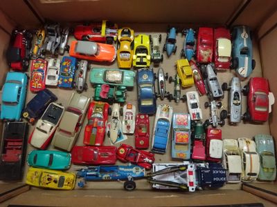 a lot of toy cars in a box on the table