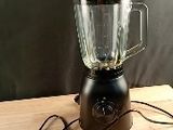 a blender that is sitting on a wooden table