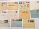 a lot of old letters and envelopes on the table