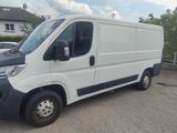 a white van that is parked in a parking lot