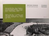 a book with a picture of a river and a bridge
