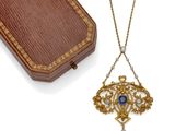 an image of a necklace and a box on a white background