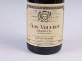 a bottle of wine that is sitting on a table