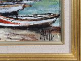 two boats that are sitting on the beach