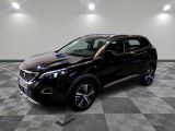 the black suv is parked in a large room with a checkered floor