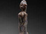 an image of a statue of a woman on a black background