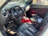 a picture of the interior of a car with a steering wheel