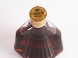 a bottle of syrup that is sitting on a table