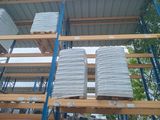 many stacks of boxes on the pallets in the warehouse