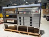 an image of a metal workbench in a warehouse