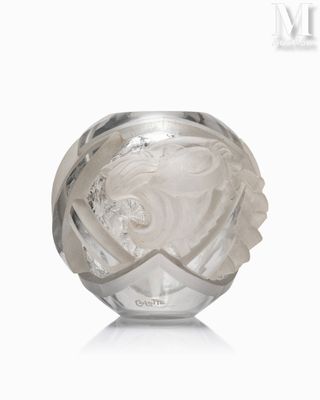 an image of a clear glass vase with a face on it