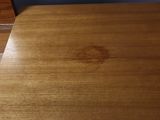 a wooden desk with a computer on top of it