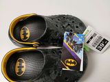 batman crocs slippers with batman logo on them