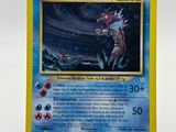 a close up of a pokemon card on a white surface