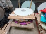 a pile of cds on top of a wooden pallet
