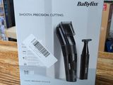 a box of babylis hair clippers sitting on a table