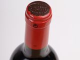 a bottle of wine that is sitting on a table