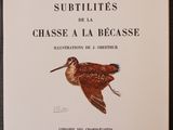 un vieux livre avec l'image d'un oiseau