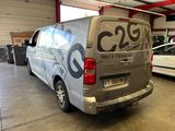 a van that is parked inside of a garage