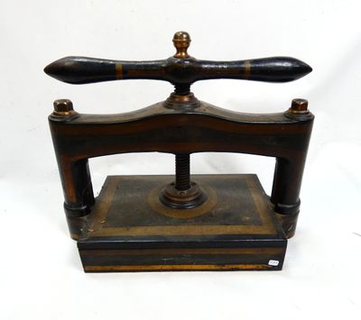 an old fashioned wooden and metal device on a white background