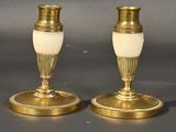pair of antique brass candlesticks with opalized glass shades