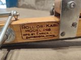 a close up of a wooden object with a metal handle