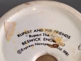 a close up of a small white vase with a quote on it