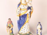 three figurines of the virgin mary and child jesus