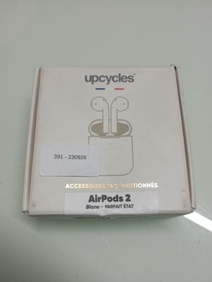 packaging of an apple airpods 2 in a box on a table