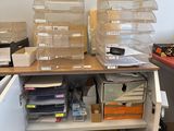 a lot of boxes that are sitting on a shelf