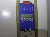 a close up of a control panel on a refrigerator