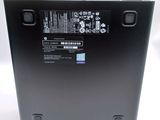 the back of a laptop with a battery on top of it